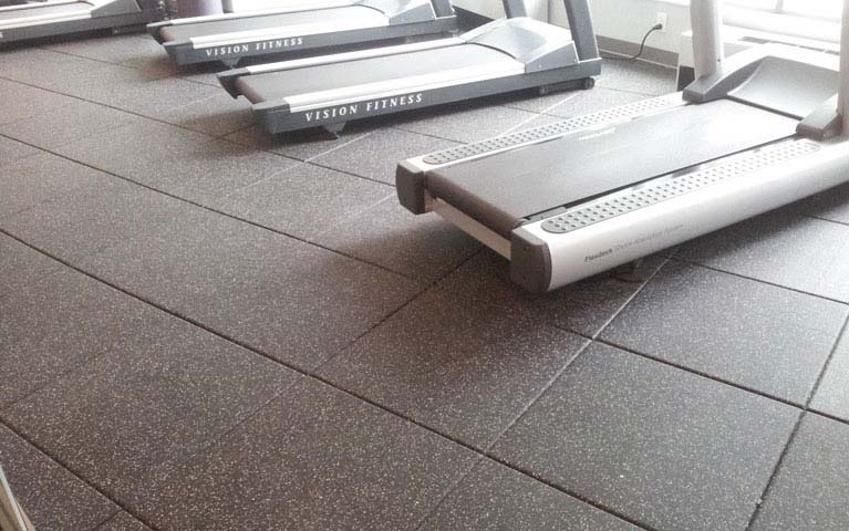 Gym machine area using rubber tiles flooring