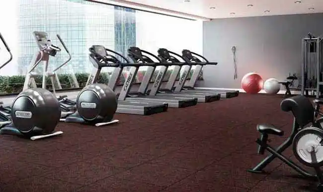 Dynoflex Strides Tiles used in a gym. Machines area