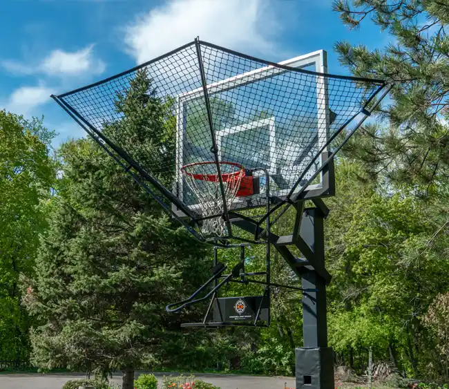 Man smoothing a a 20x40 backyard ice rink surface with a 52 inches NiceIce™ Resurfacer