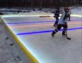 Ice rink using NiceRink™ Under Ice LED Lights, including red