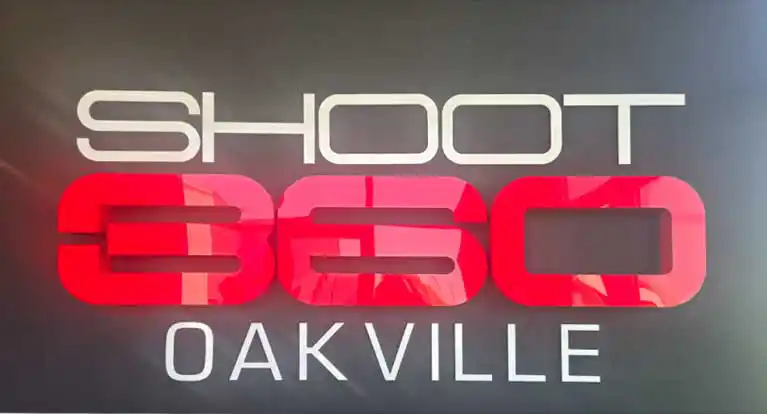 The official indoor branding sign for Shoot 360 Oakville, Ontario's most technologically advanced basketball training facility featuring custom Junckers hardwood courts.
