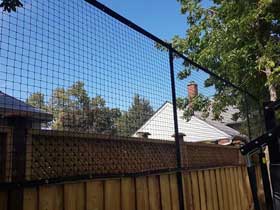 Containment Netting on Fence