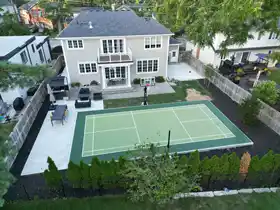 Expert installation of a  26' by 50' all-weather court in Burlington. The durable, low-maintenance surface is ideal for safe fun and training for young athletes.<br />
 