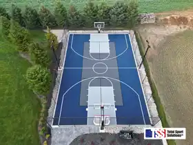 A premium multi-game court in Vanessa: The lighted surface and full fencing accommodate basketball, pickleball, and hockey for serious training or casual play.