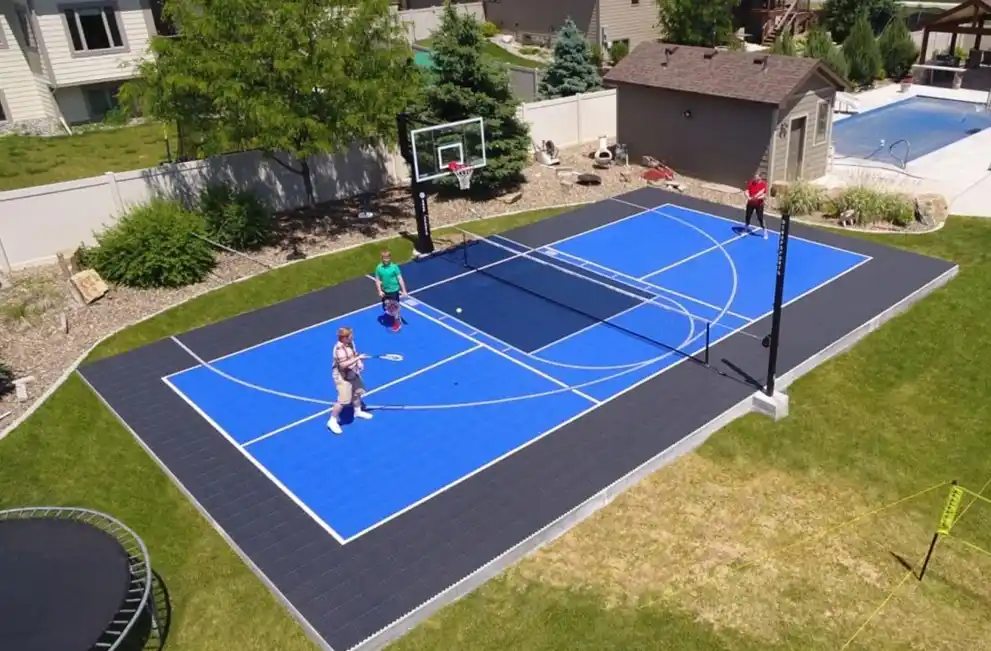 Family playing in backyard court